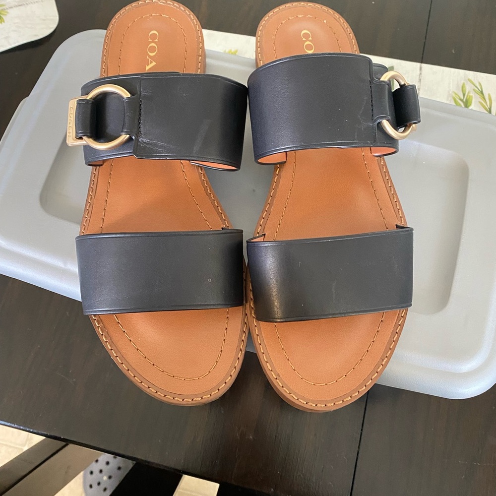 Ladies gently worn authentic black leather Coach sandals